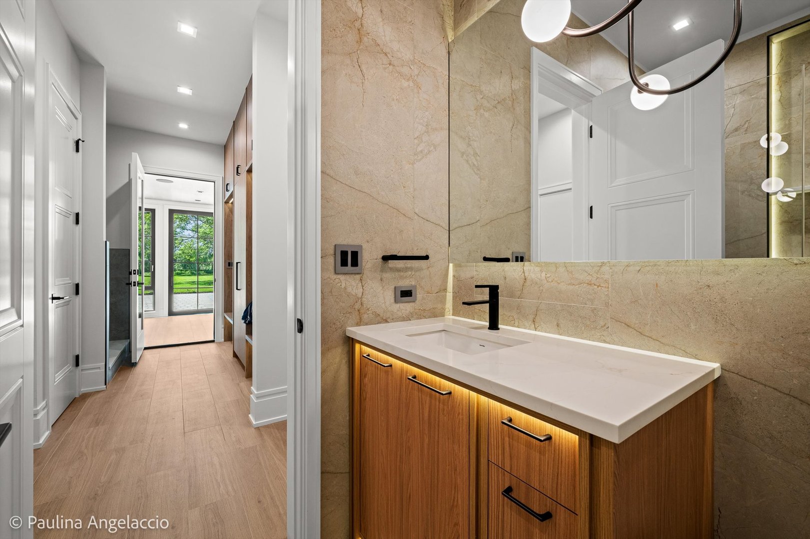 699 Plum Tree Road Barrington Hills, IL 60010 - Photo 33 of 84 a view of a kitchen cabinets a sink a counter space and a refrigerator