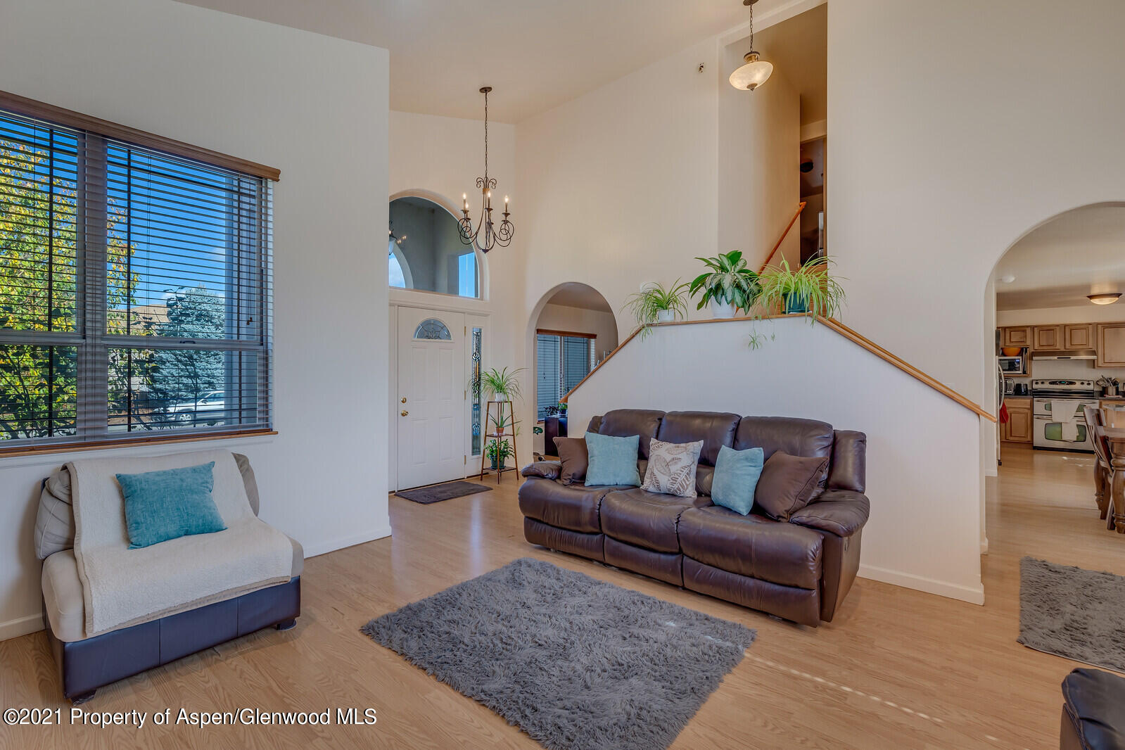 925 East 18th Street Rifle, CO 81650 - Photo 5 of 24 a living room with furniture and a wooden floor