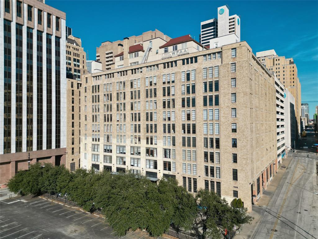 1122 Jackson Street, Unit 301 Dallas, TX 75202 - Photo 1 of 23 a front view of a building