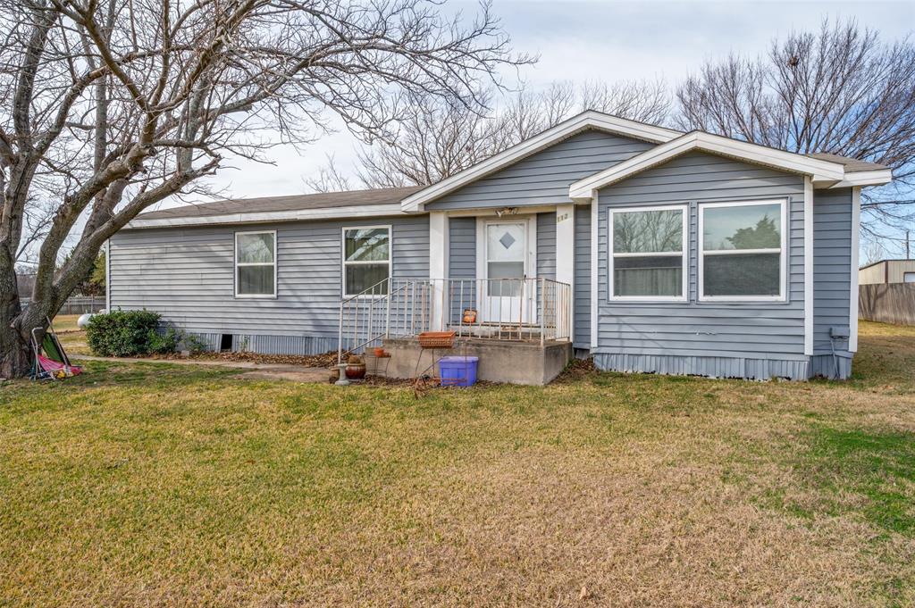 112 Stark Road Frisco, TX 75036 - Photo 7 of 9 a view of a house with a yard