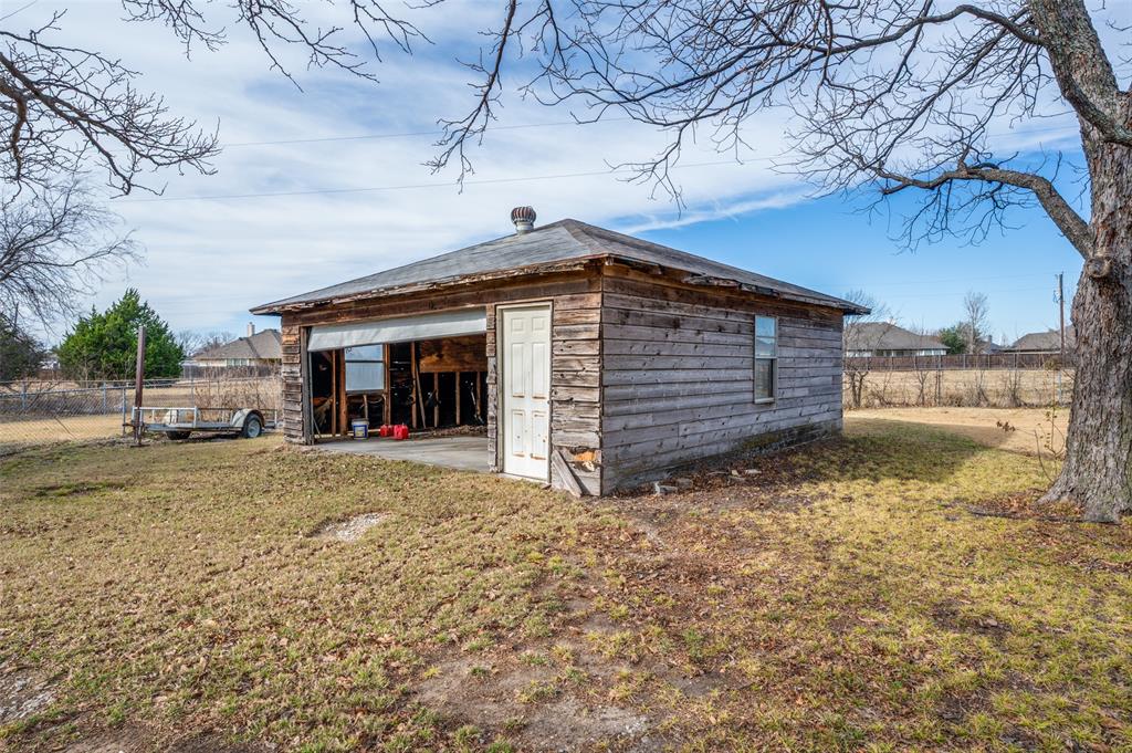 112 Stark Road Frisco, TX 75036 - Photo 9 of 9 a front view of a house with a yard