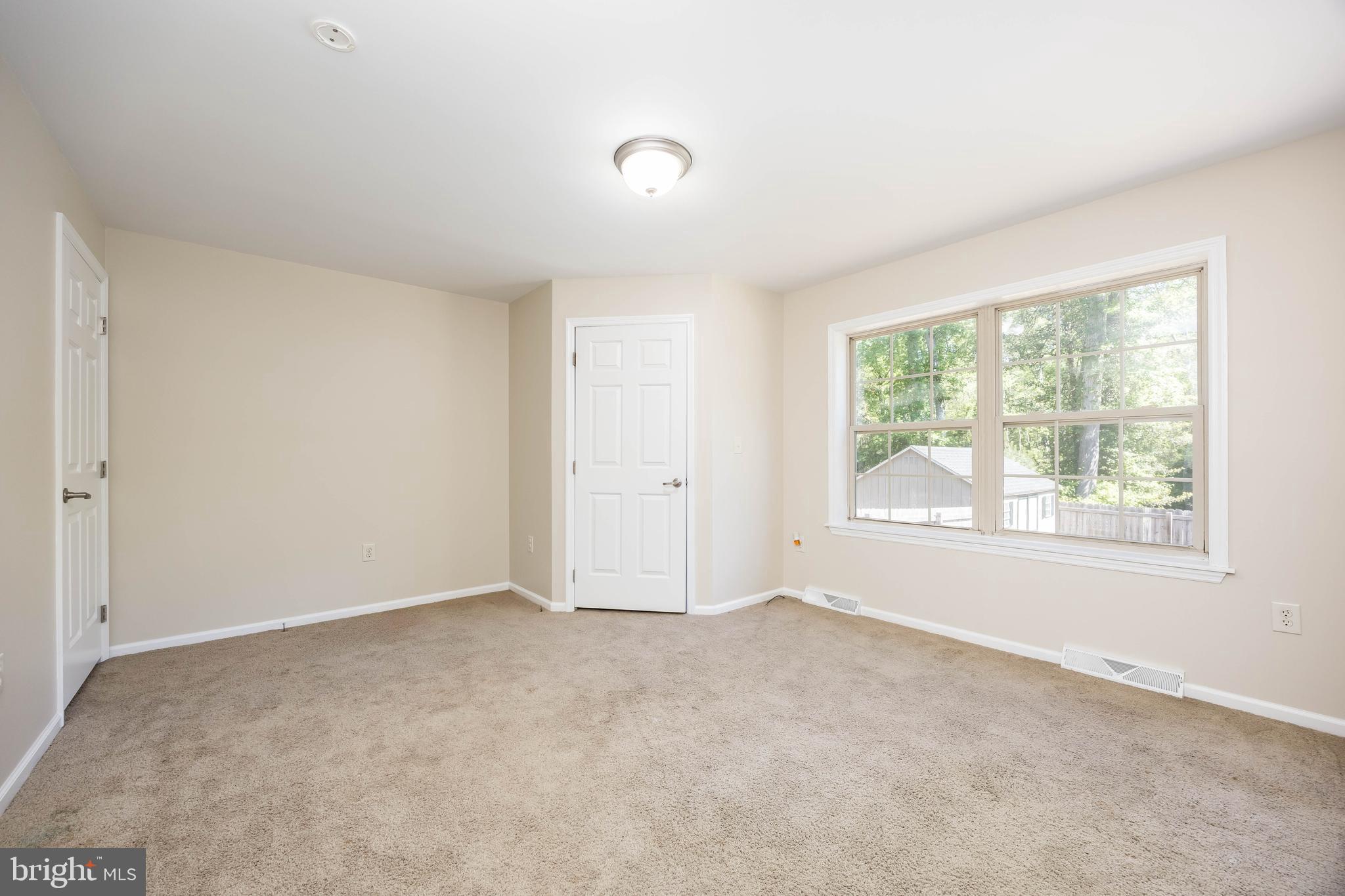 6635 Libertytown Road Berlin, MD 21811 - Photo 38 of 88 a view of an empty room with a window
