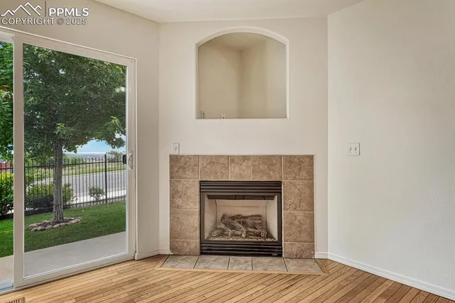 a living room with a fireplace