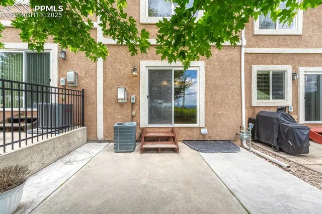 a house with trees in front of it
