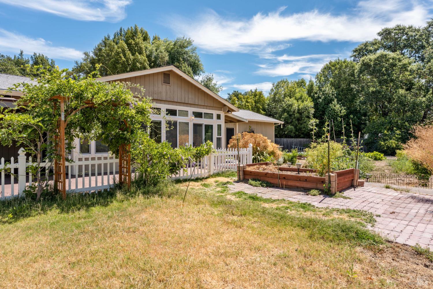 8960 East Road Redwood Valley, CA 95470 - Photo 23 of 37 Rear Yard to Sunroom and Garden