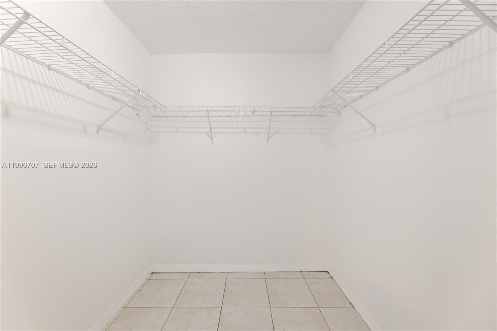 3027 Southwest 24th Street Miami, FL 33145 - Photo 17 of 28 Walk-in Closet in Primary Bedroom