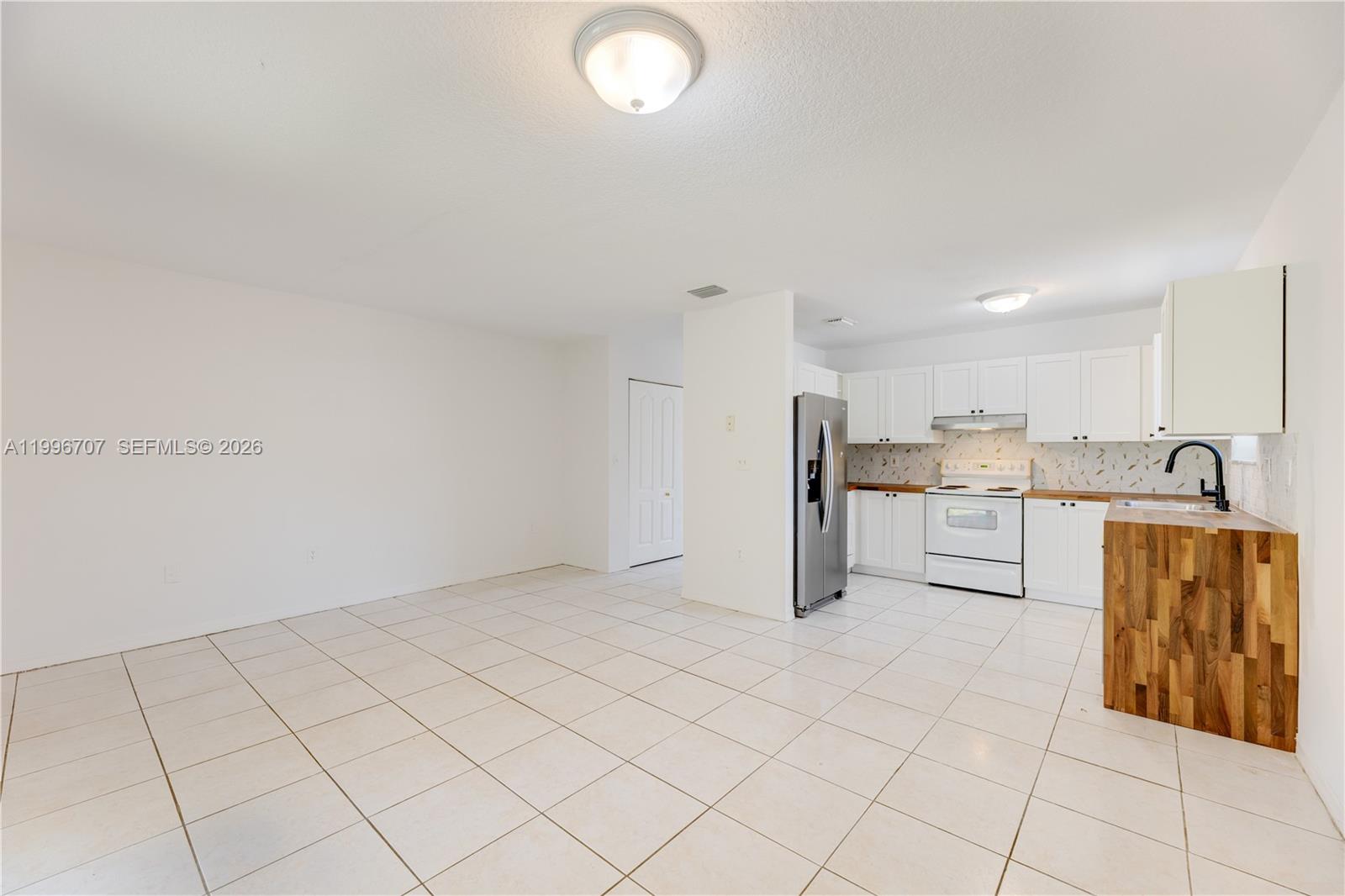 3027 Southwest 24th Street Miami, FL 33145 - Photo 8 of 28 Dining/Family Room + Kitchen