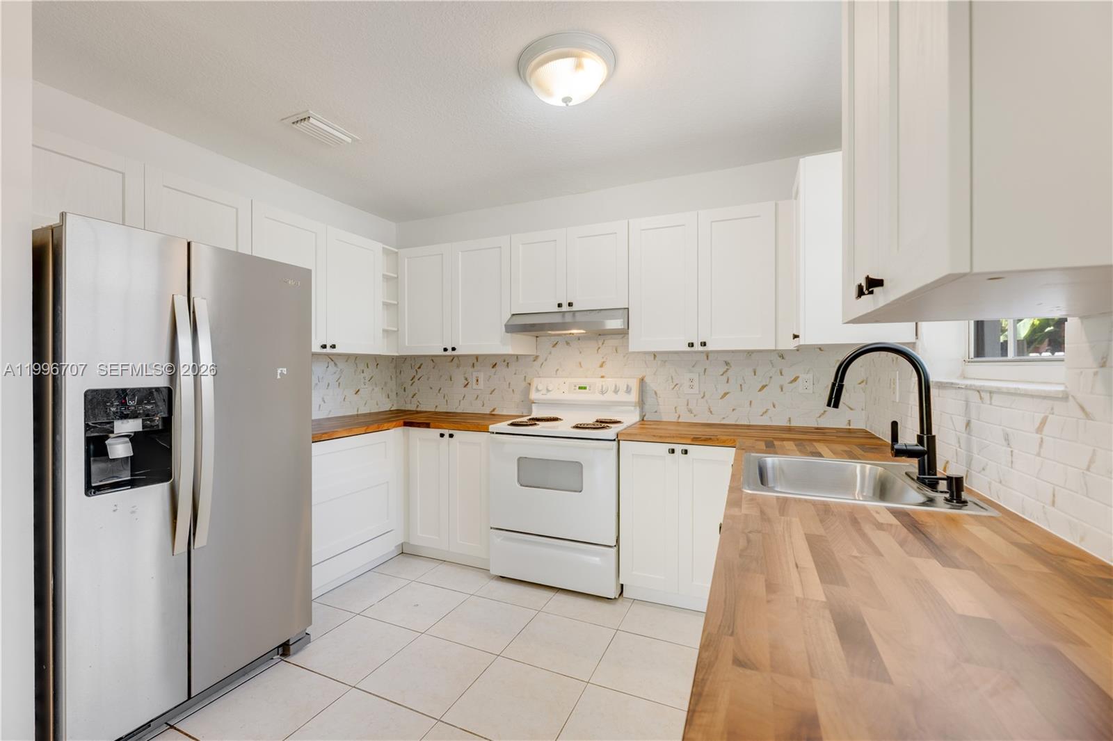 3027 Southwest 24th Street Miami, FL 33145 - Photo 9 of 28 Kitchen - Newly updated