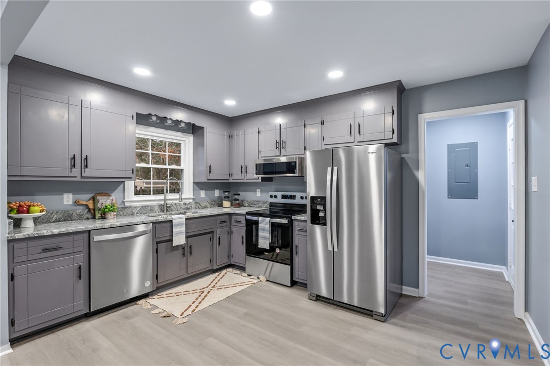 17416 Chemin Road Petersburg, VA 23803 - Photo 12 of 29 a kitchen with stainless steel appliances granite countertop a refrigerator and a stove top oven