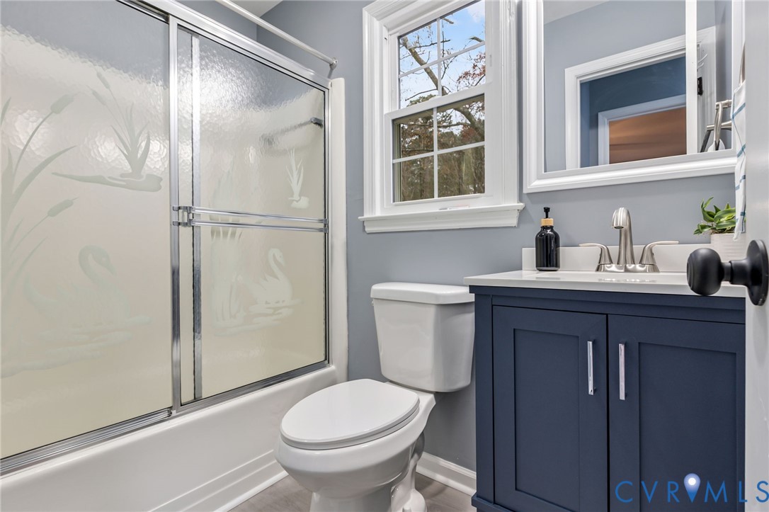 17416 Chemin Road Petersburg, VA 23803 - Photo 17 of 29 a bathroom with a sink toilet and shower