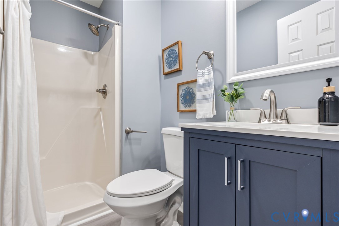 17416 Chemin Road Petersburg, VA 23803 - Photo 22 of 29 a bathroom with a sink toilet and shower