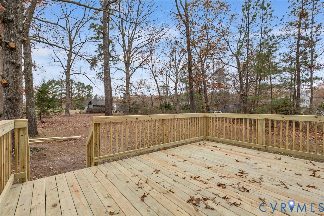 17416 Chemin Road Petersburg, VA 23803 - Photo 25 of 29 a view of balcony with wooden floor and fence
