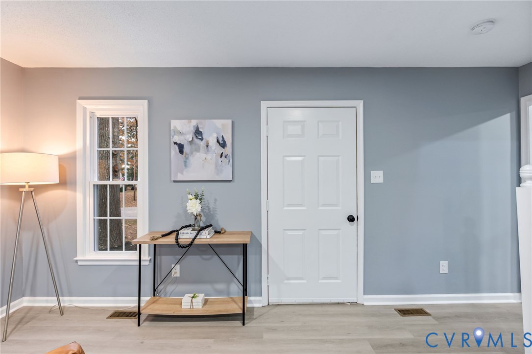 17416 Chemin Road Petersburg, VA 23803 - Photo 4 of 29 a view of room with furniture and wooden floor
