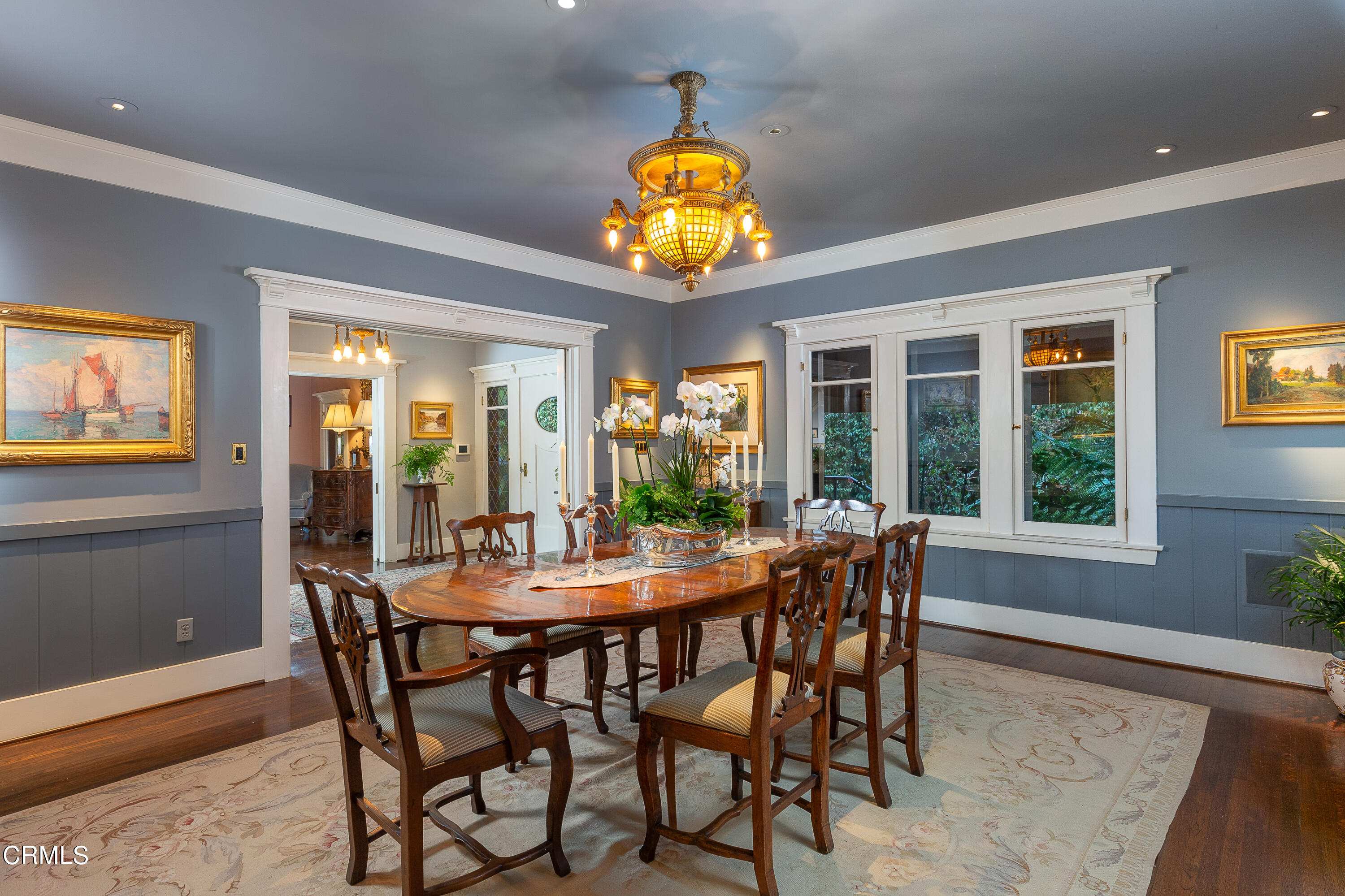 470 Bradford Street Pasadena, CA 91105 - Photo 11 of 75 a dining room with furniture a potted plant and wooden floor