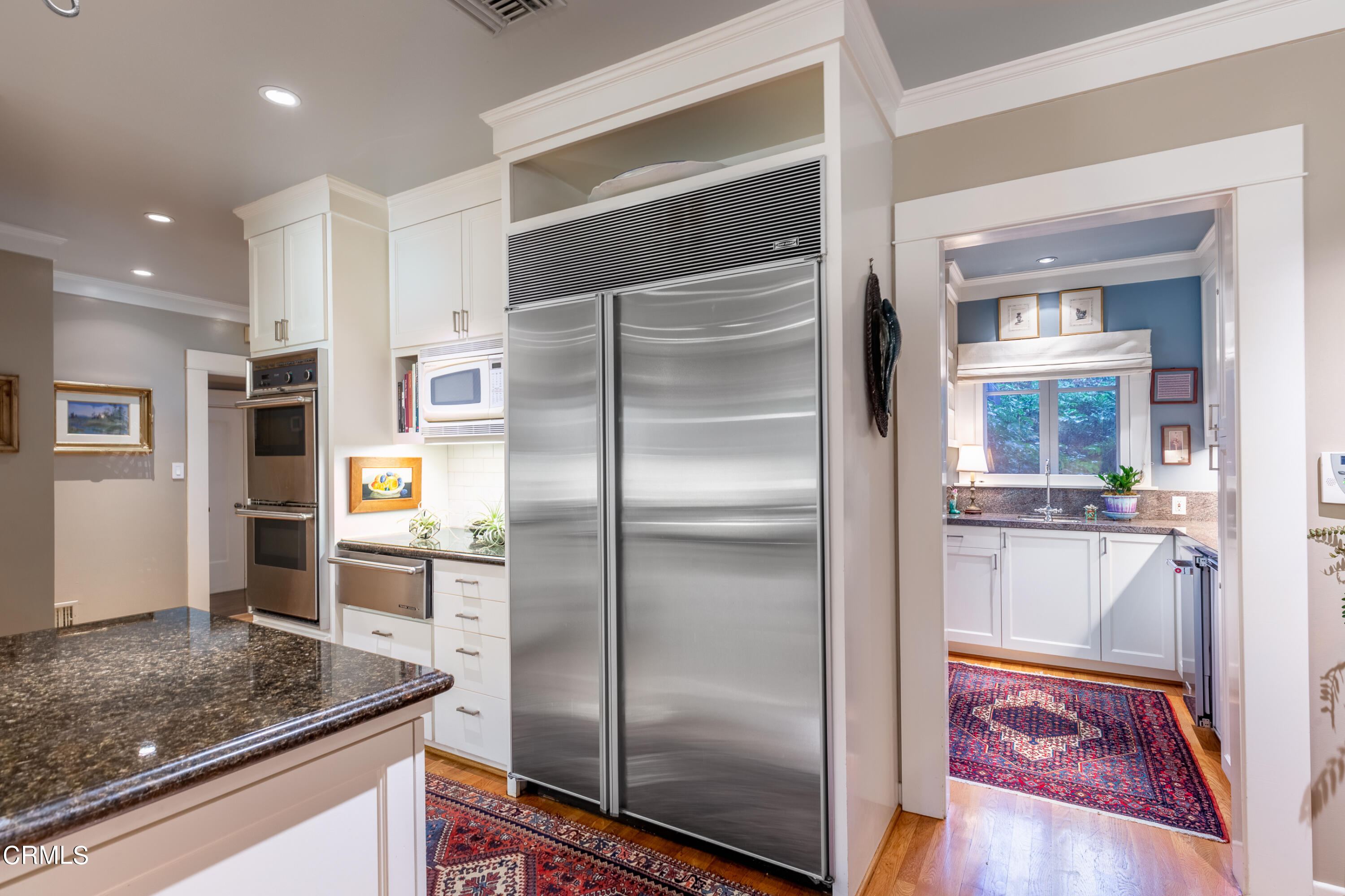 470 Bradford Street Pasadena, CA 91105 - Photo 16 of 75 a kitchen with stainless steel appliances granite countertop a refrigerator and a sink