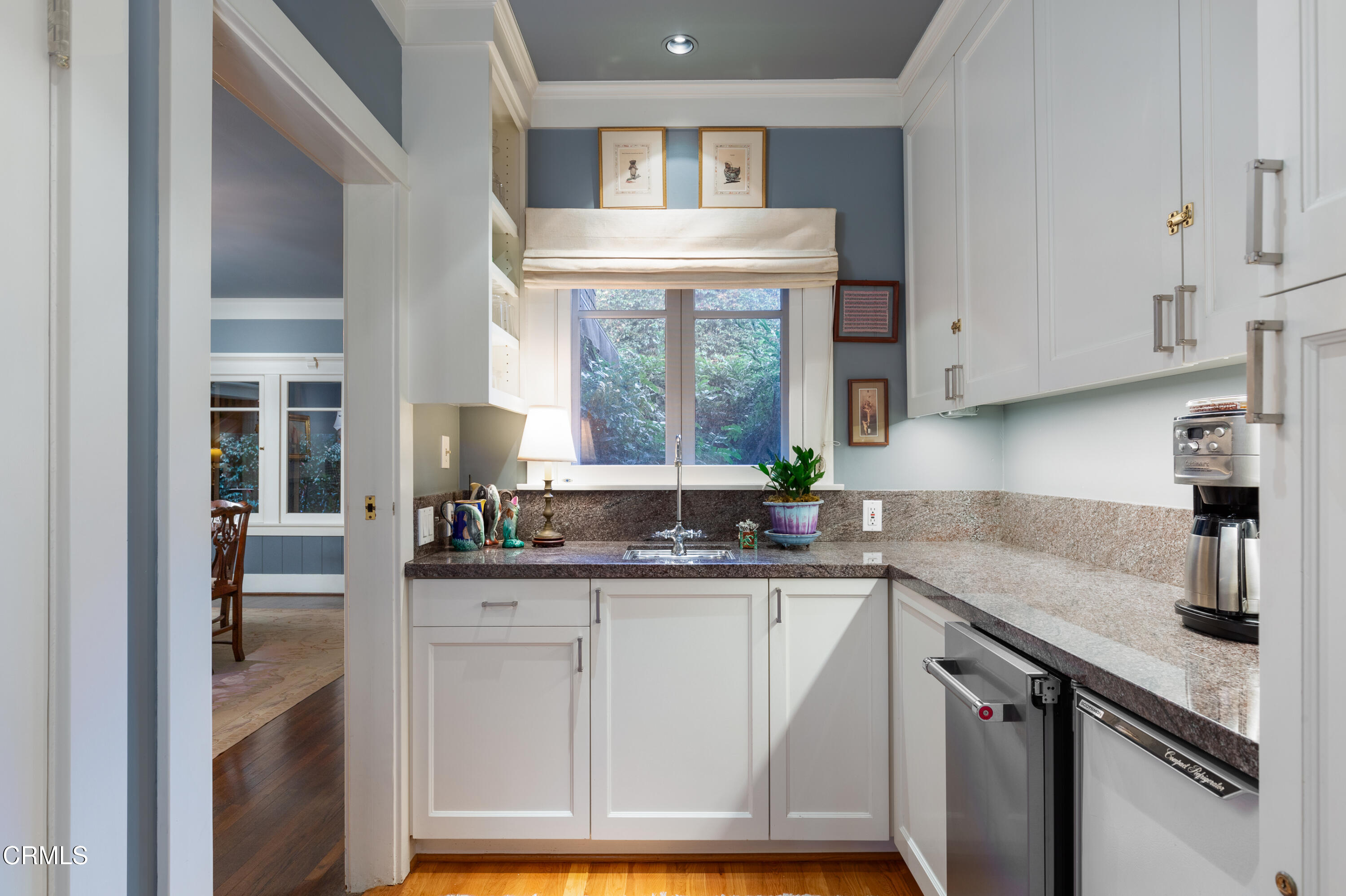 470 Bradford Street Pasadena, CA 91105 - Photo 17 of 75 a kitchen with granite countertop a sink and cabinets