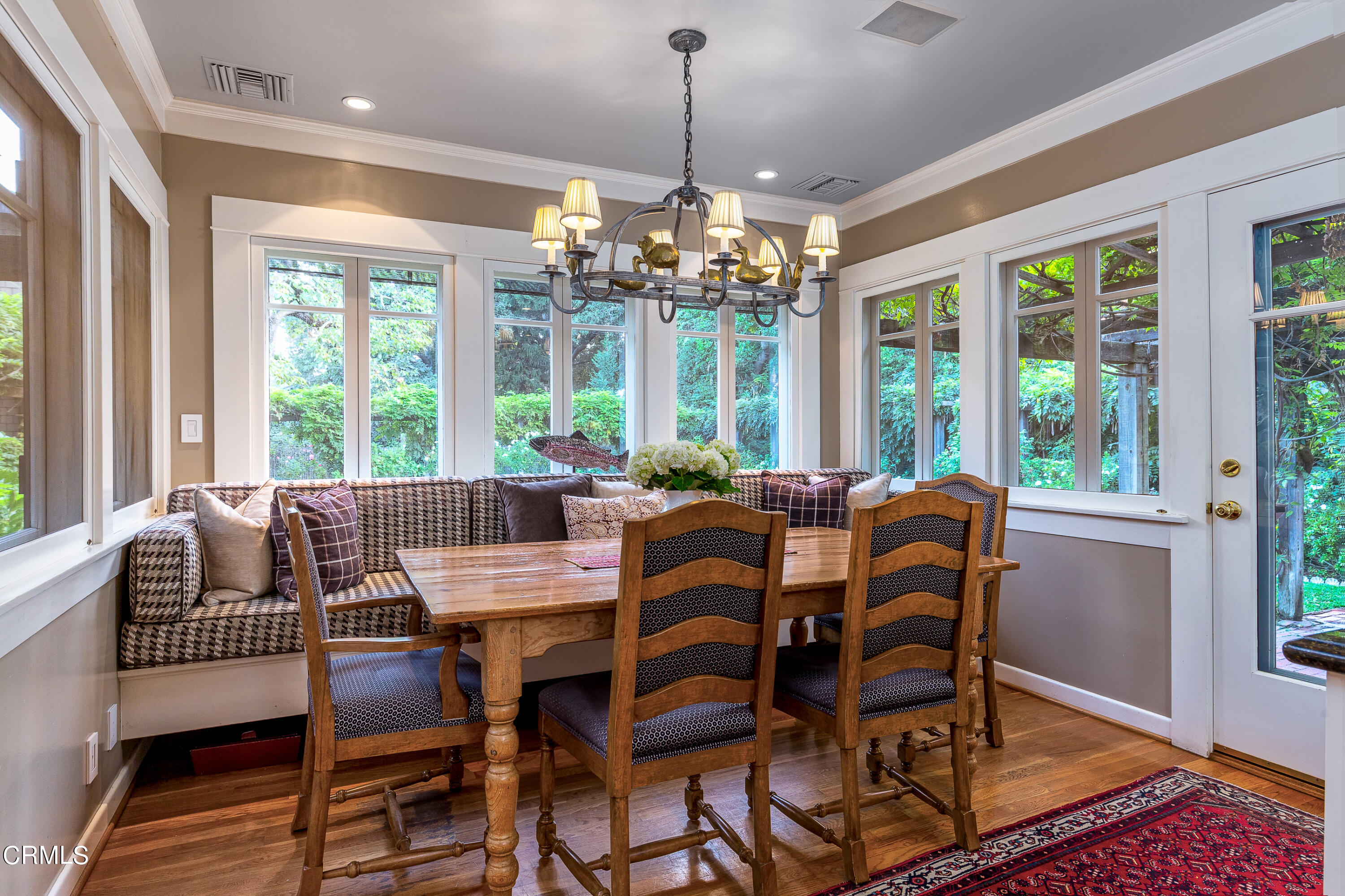 470 Bradford Street Pasadena, CA 91105 - Photo 19 of 75 a view of a dining room with furniture wooden floor and chandelier