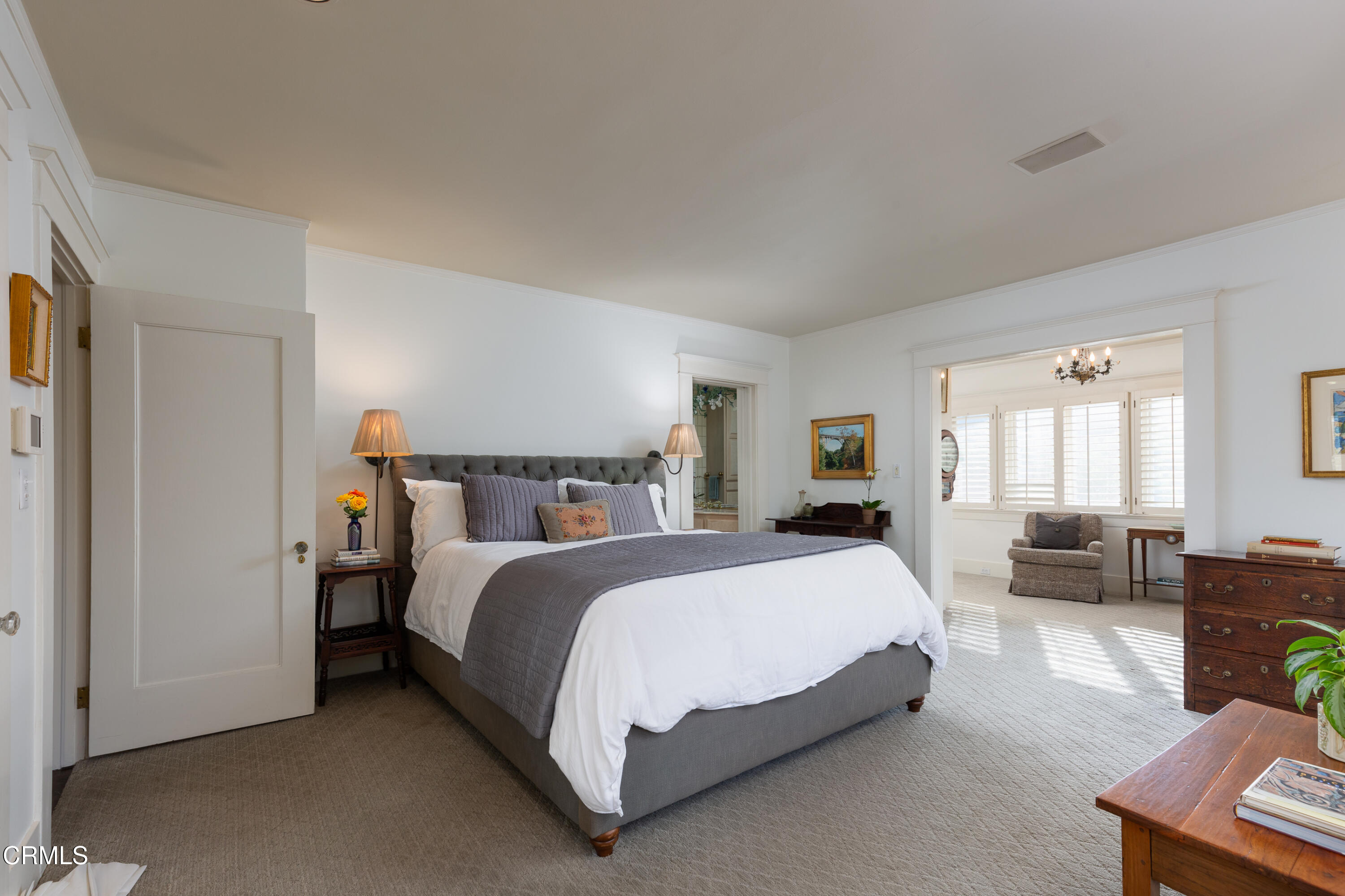 470 Bradford Street Pasadena, CA 91105 - Photo 23 of 75 a spacious bedroom with a bed and furniture