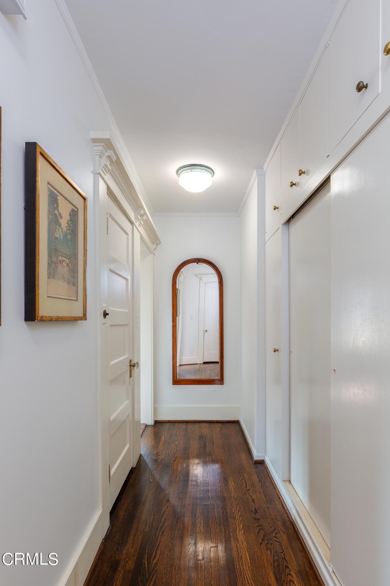 470 Bradford Street Pasadena, CA 91105 - Photo 32 of 75 a view of a hallway with wooden floor and front door