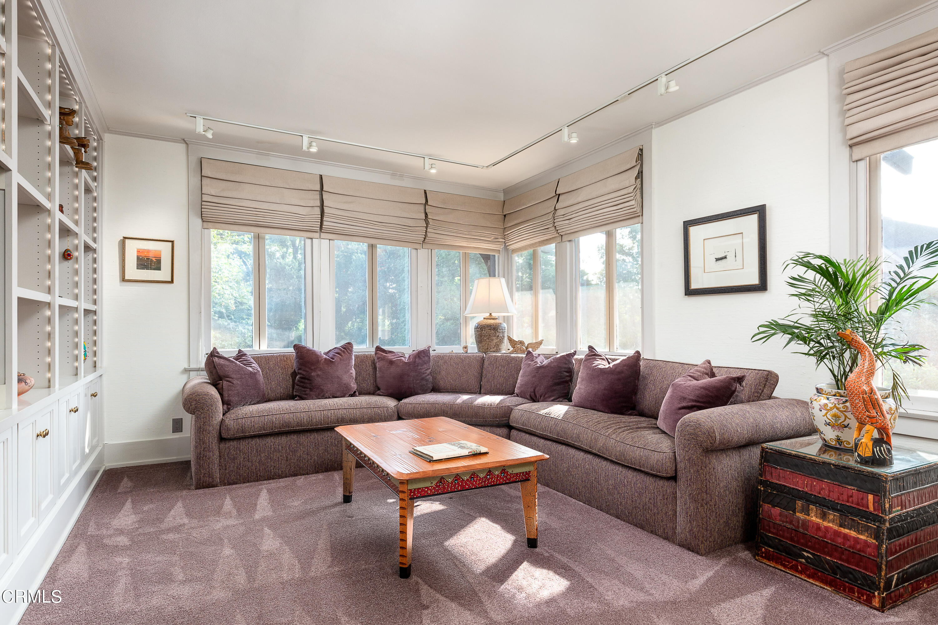470 Bradford Street Pasadena, CA 91105 - Photo 38 of 75 a living room with furniture a table and a large window