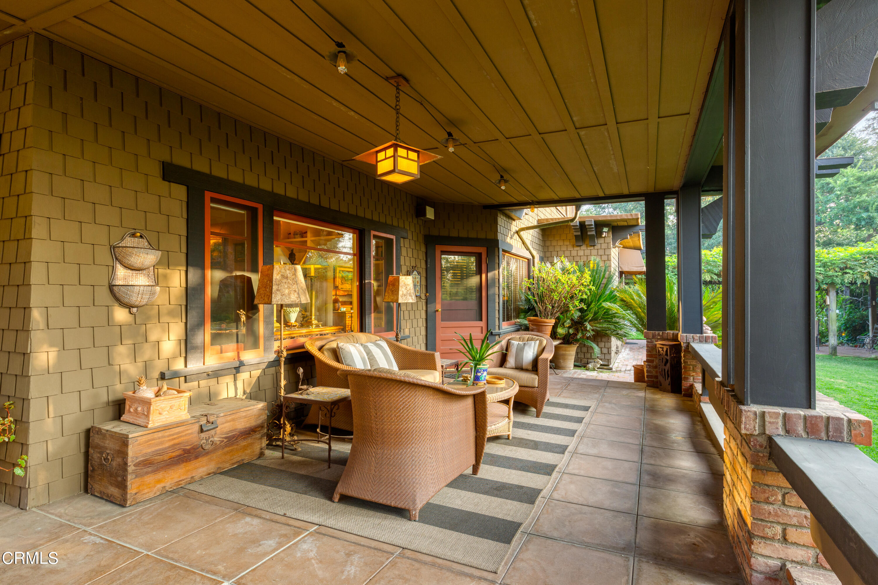 470 Bradford Street Pasadena, CA 91105 - Photo 40 of 75 a living room with patio furniture and floor to ceiling windows