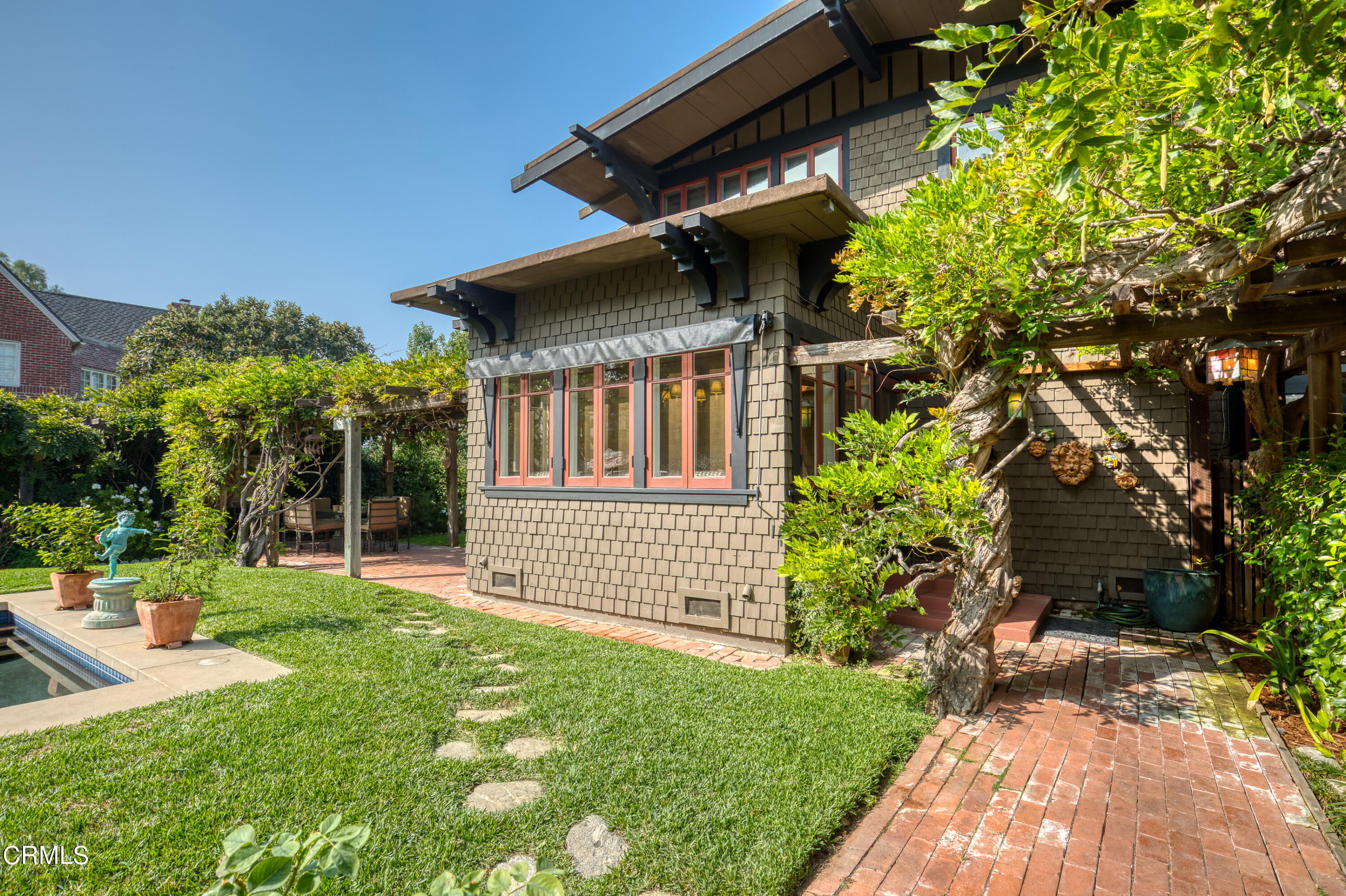 470 Bradford Street Pasadena, CA 91105 - Photo 49 of 75 a front view of a house with a garden