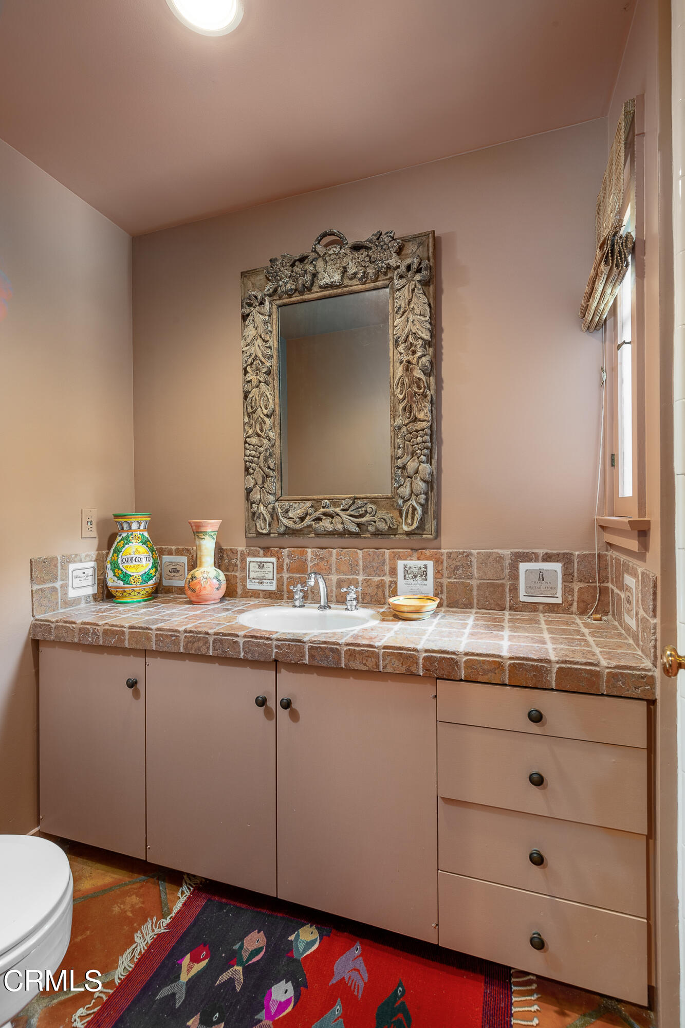 470 Bradford Street Pasadena, CA 91105 - Photo 55 of 75 a bathroom with a sink and mirror