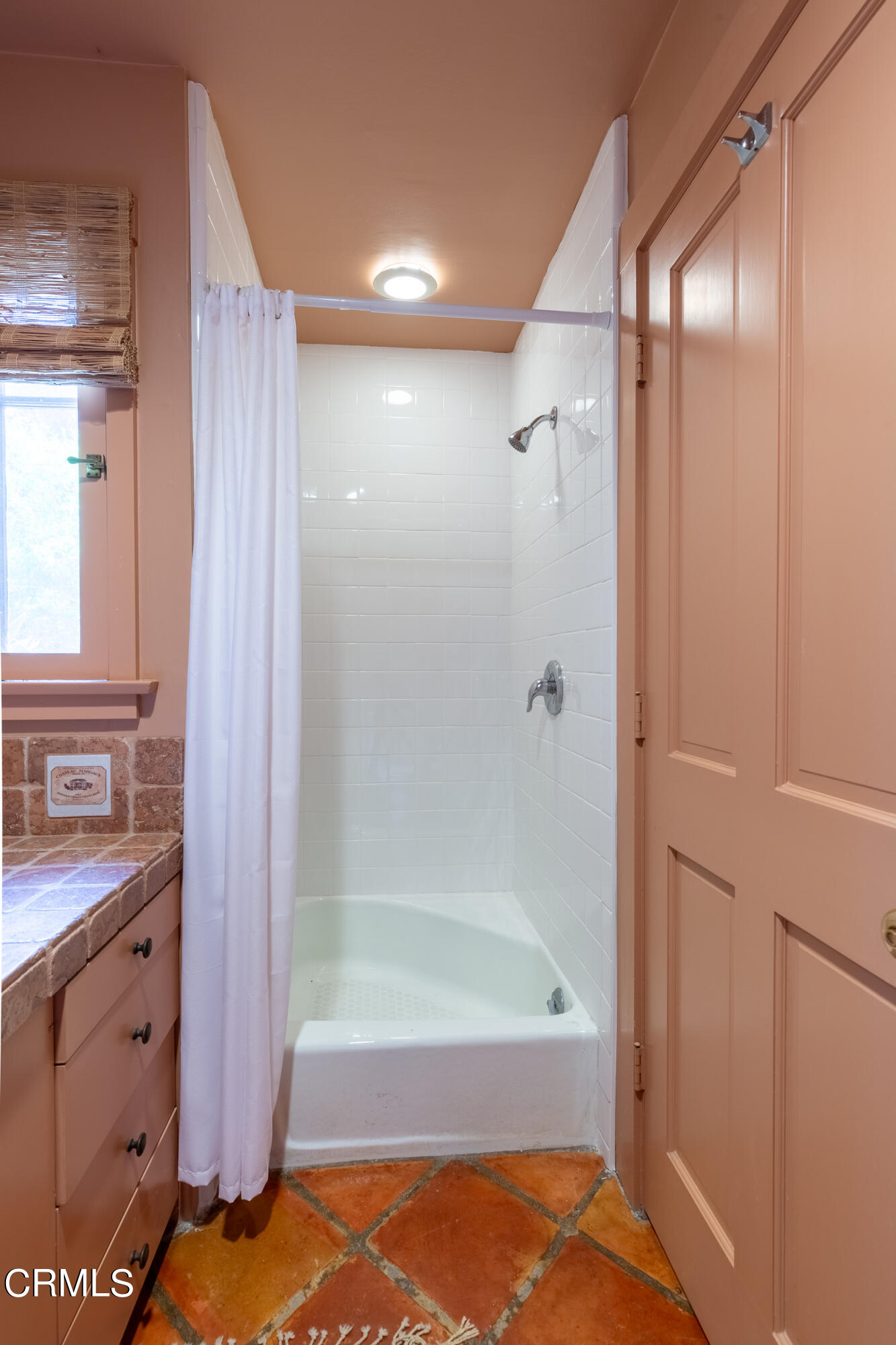 470 Bradford Street Pasadena, CA 91105 - Photo 56 of 75 a bathroom with a bathtub a sink and a shower