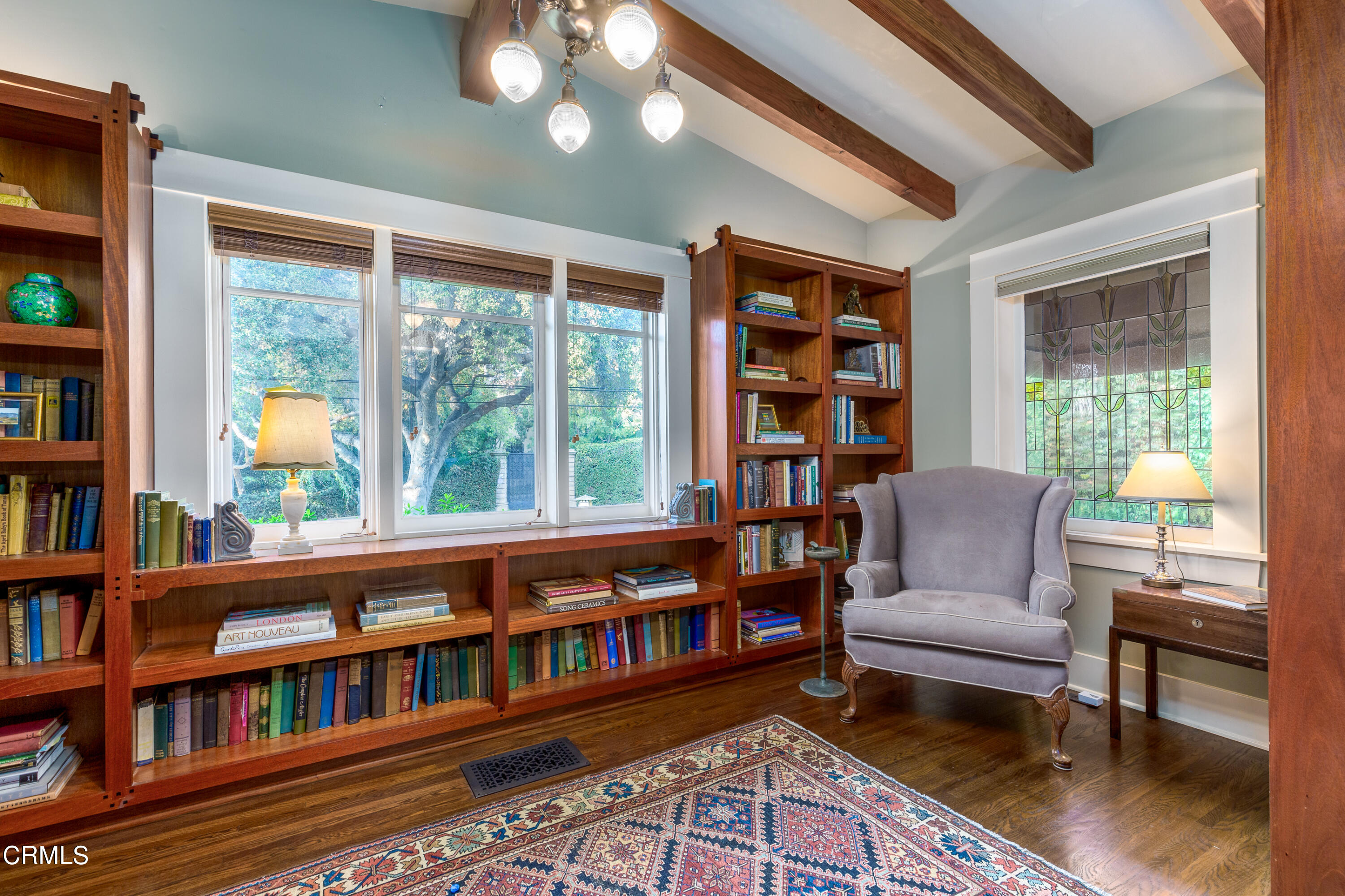 470 Bradford Street Pasadena, CA 91105 - Photo 10 of 75 a living room with furniture and a book shelf