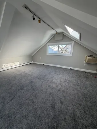 a view of an empty room with stairs
