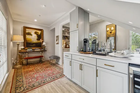 a kitchen with sink refrigerator and window