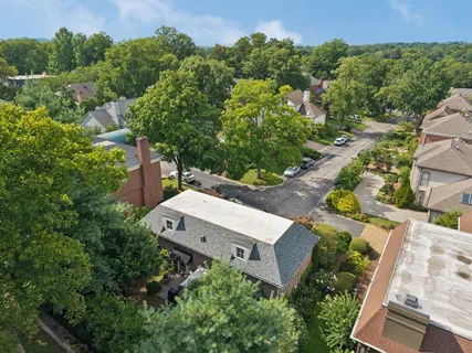 a view of a backyard with a small cabin
