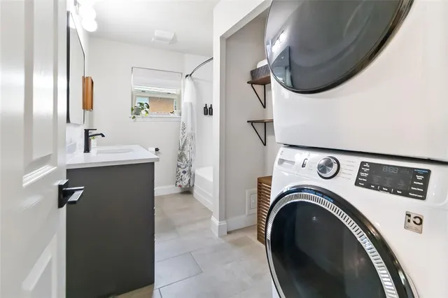 a utility room with dryer and washer