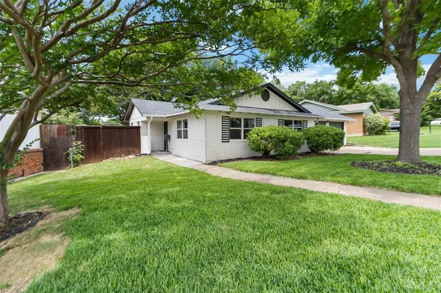 front view of a house and a yard