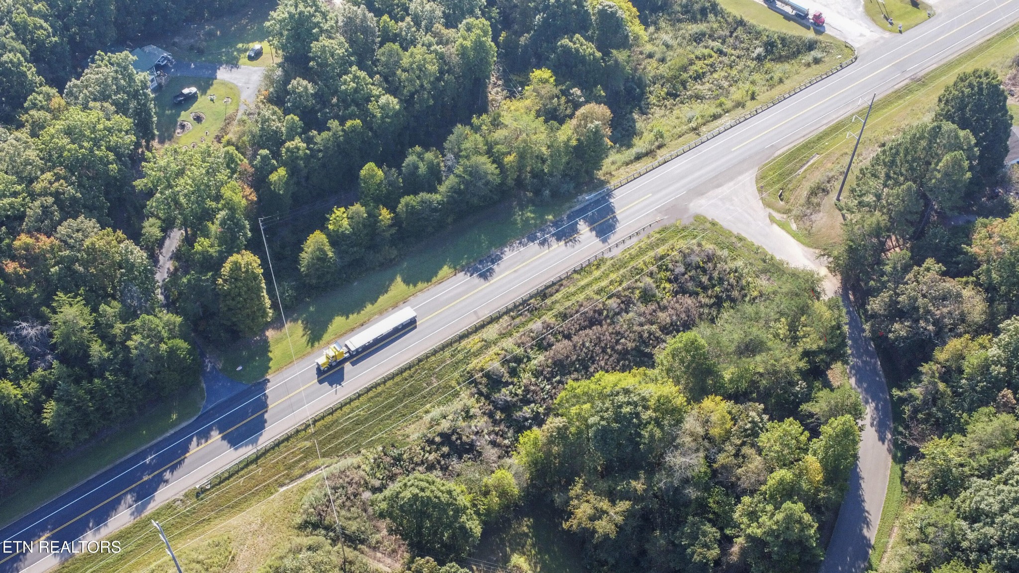 16511 Highway 72 Loudon, TN 37774 - Photo 6 of 21 a view of a lake with a tree