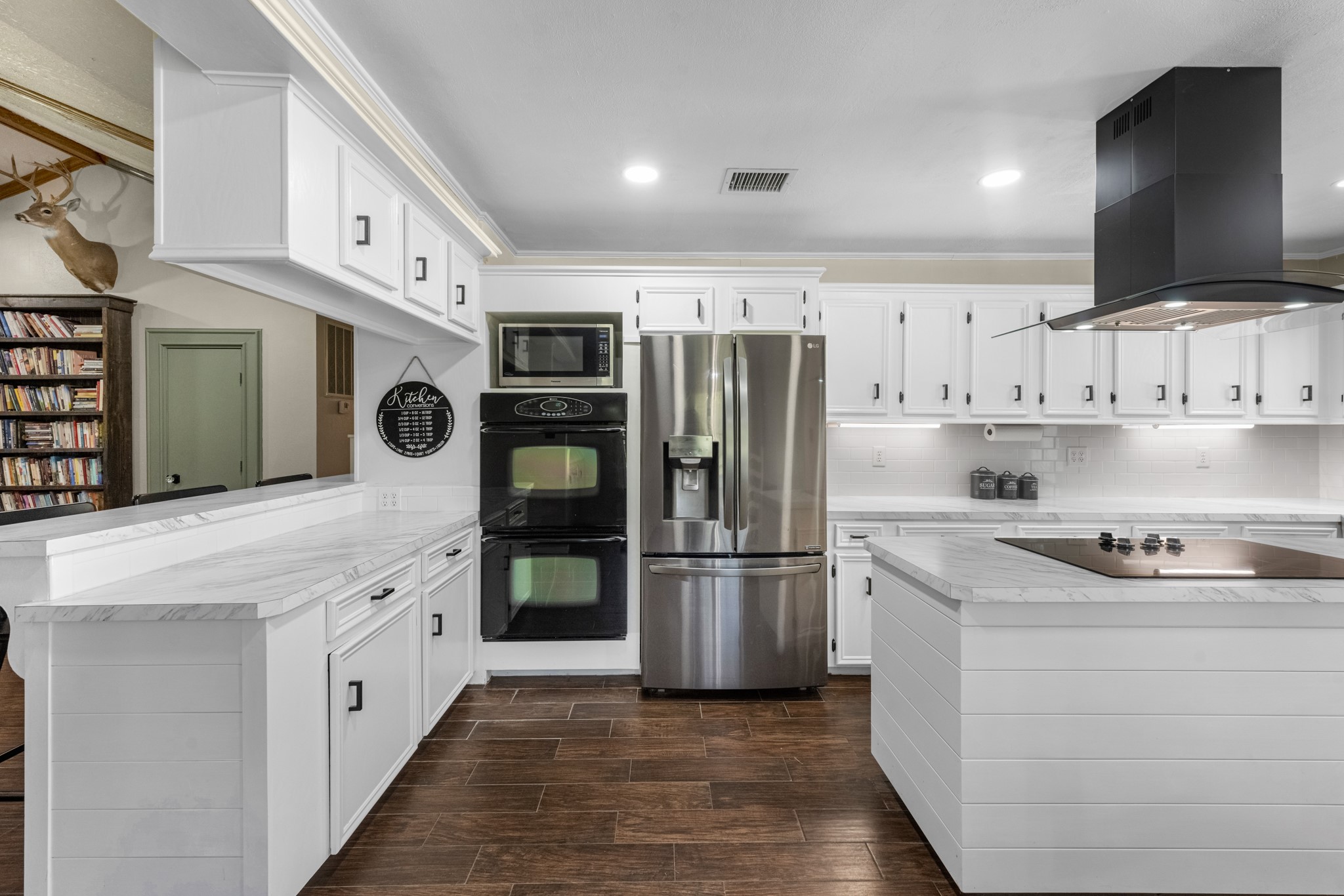 22698 Brook Forest Road New Caney, TX 77357 - Photo 13 of 46 Updated kitchen combines function, storage and a clean, bright look!
