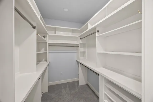 a view of an empty walk in closet