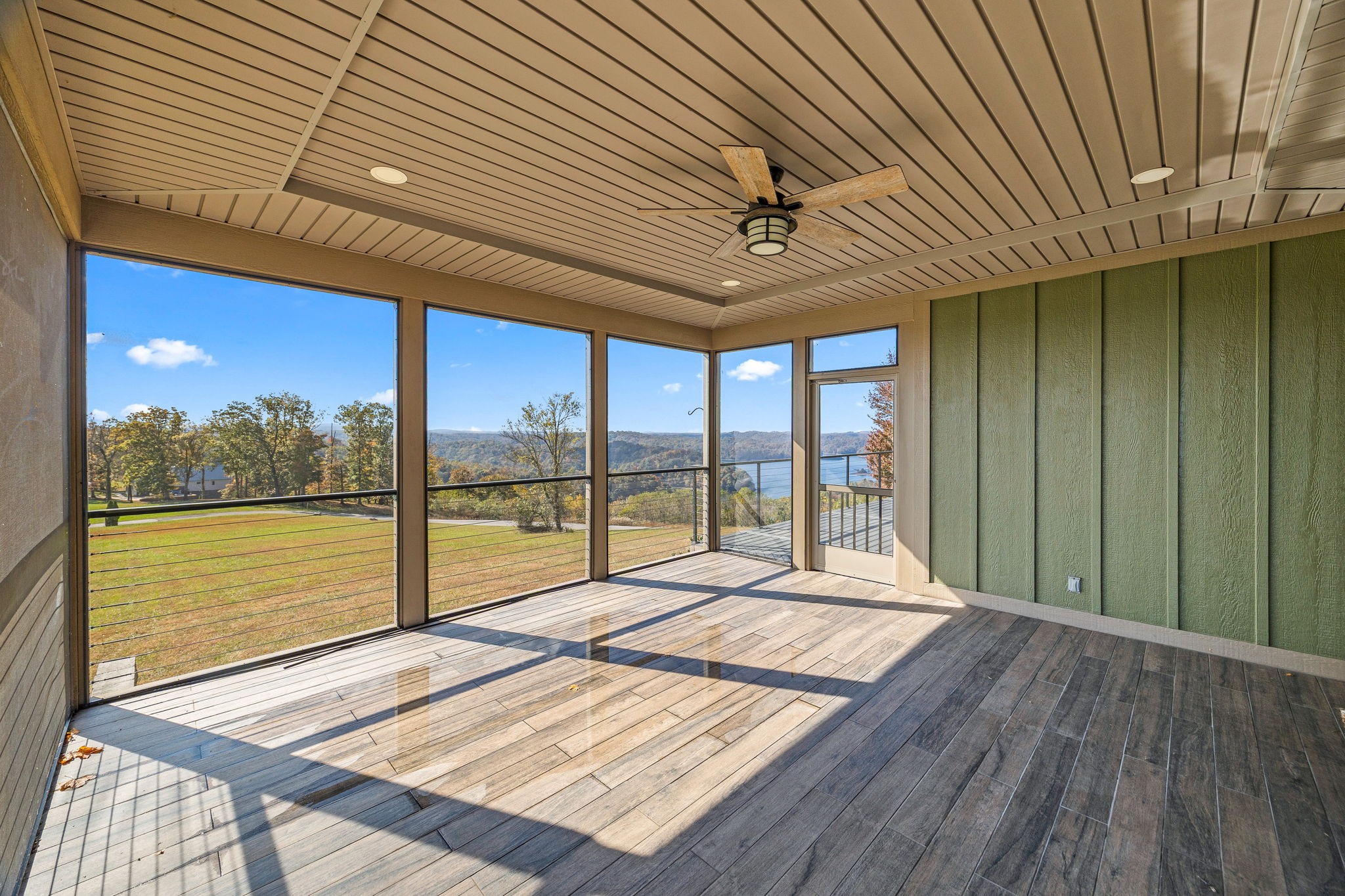3261 Swan Ridge Road Celina, TN 38551 - Photo 17 of 28 a bed sitting in a balcony next to a window