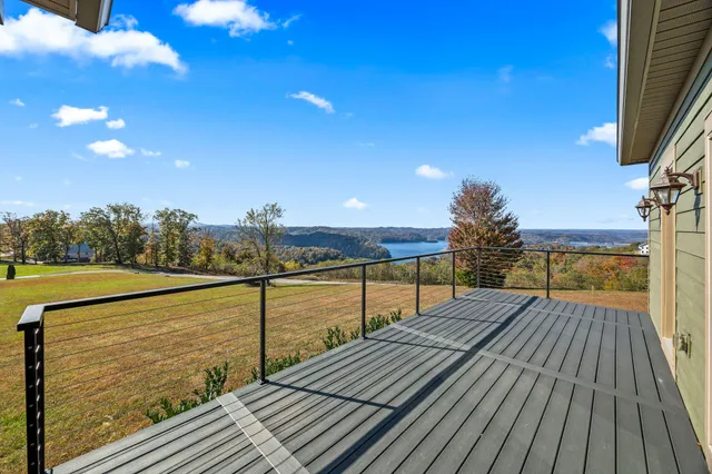 a view of outdoor space with wooden floor