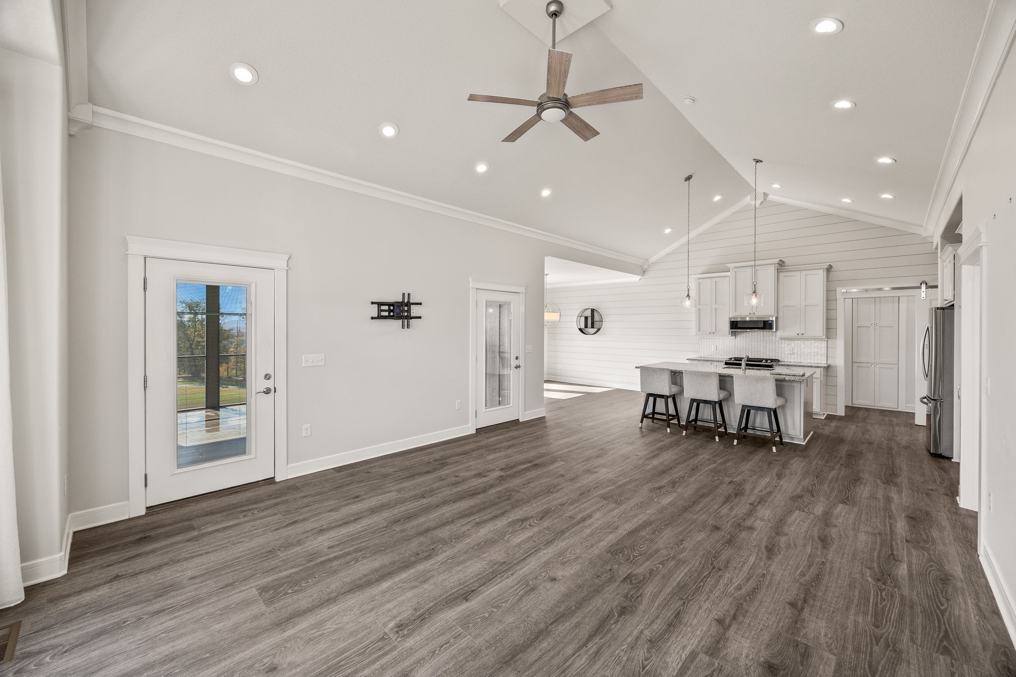 3261 Swan Ridge Road Celina, TN 38551 - Photo 2 of 28 a large kitchen with a sink and breakfast area