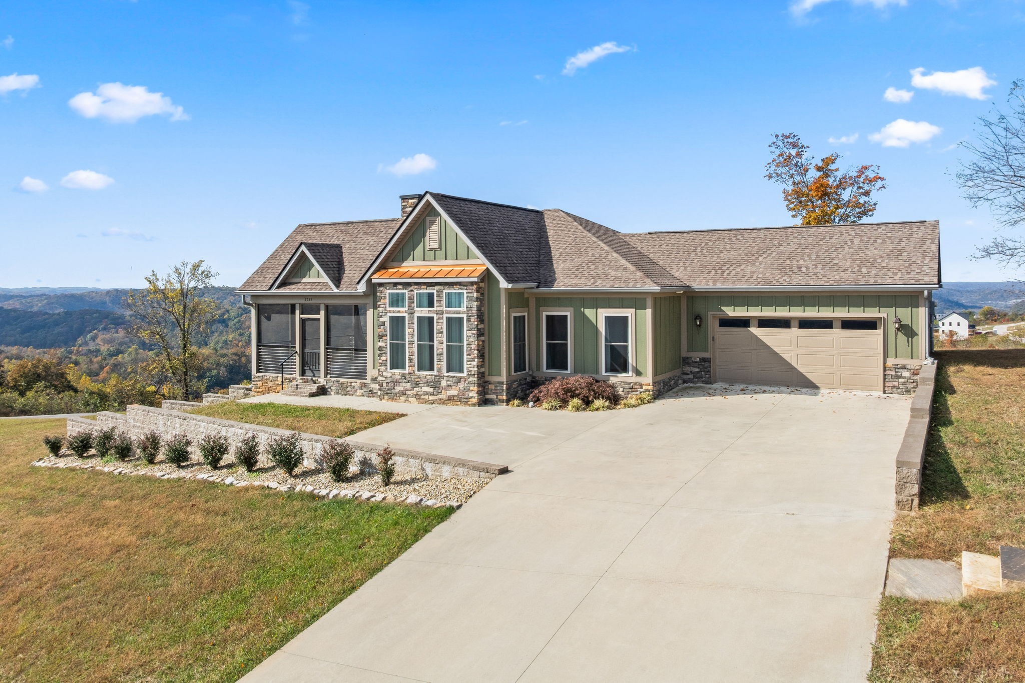 3261 Swan Ridge Road Celina, TN 38551 - Photo 23 of 28 a front view of a house with a yard