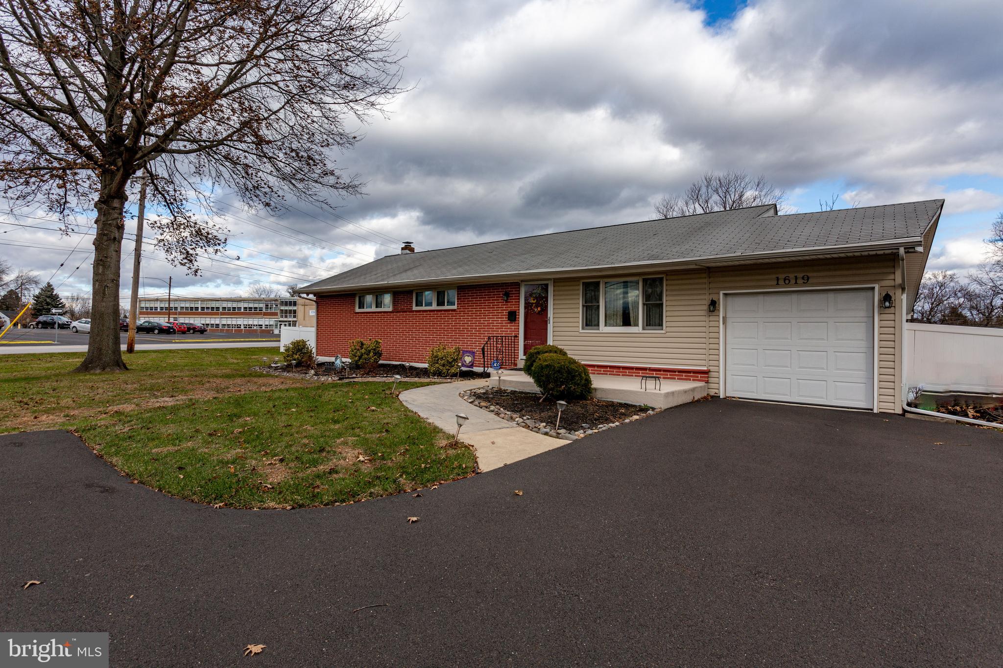 1619 West County Line Road Hatboro, PA 19040 - Photo 2 of 30 a view of a house with backyard and tree s