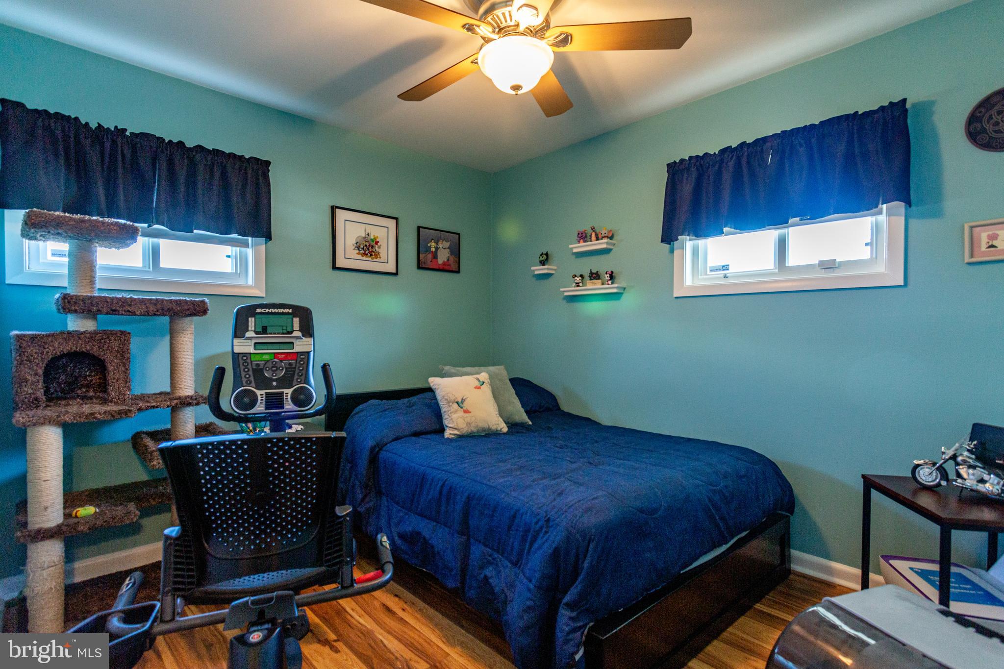 1619 West County Line Road Hatboro, PA 19040 - Photo 21 of 30 a bedroom with furniture and a baby crib