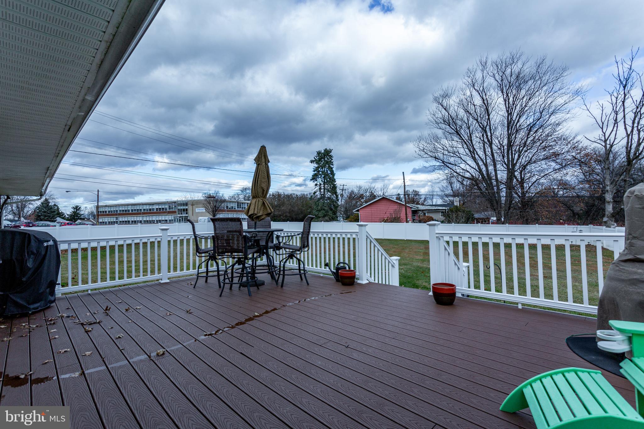 1619 West County Line Road Hatboro, PA 19040 - Photo 24 of 30 a view of a chair and tables in the balcony
