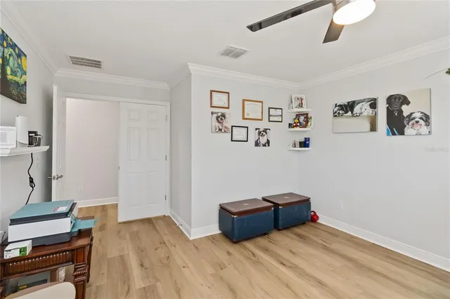 a view of a swimming pool with a patio