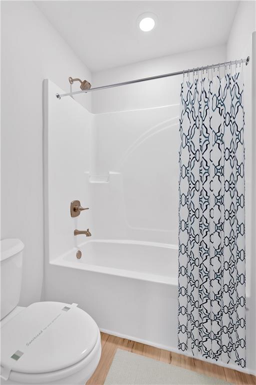 107 Lavender Circle Calhoun, GA 30701 - Photo 15 of 23 a bathroom with a toilet and a shower