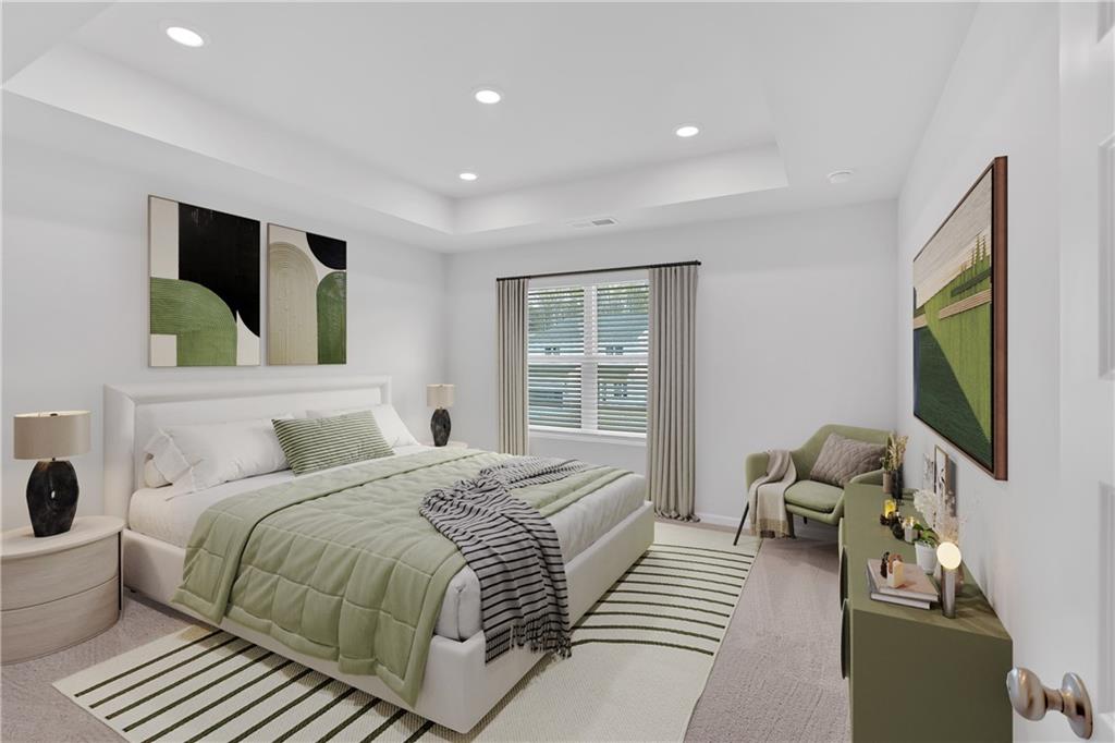 107 Lavender Circle Calhoun, GA 30701 - Photo 16 of 23 a bedroom with a bed and flat screen tv