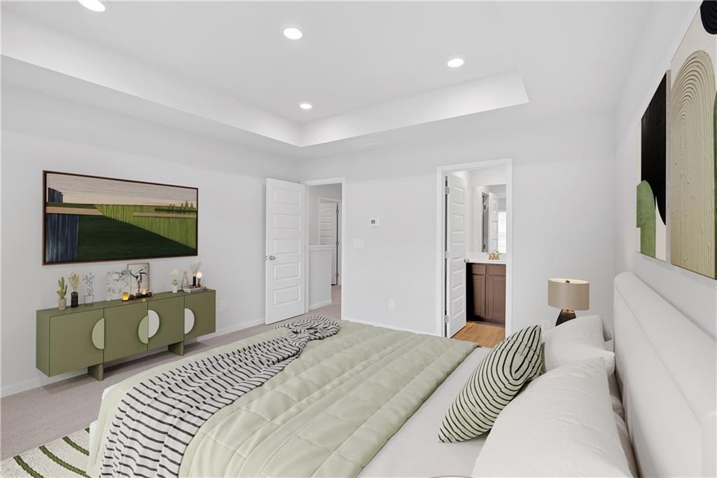 107 Lavender Circle Calhoun, GA 30701 - Photo 17 of 23 a bedroom with a bed and a flat screen tv