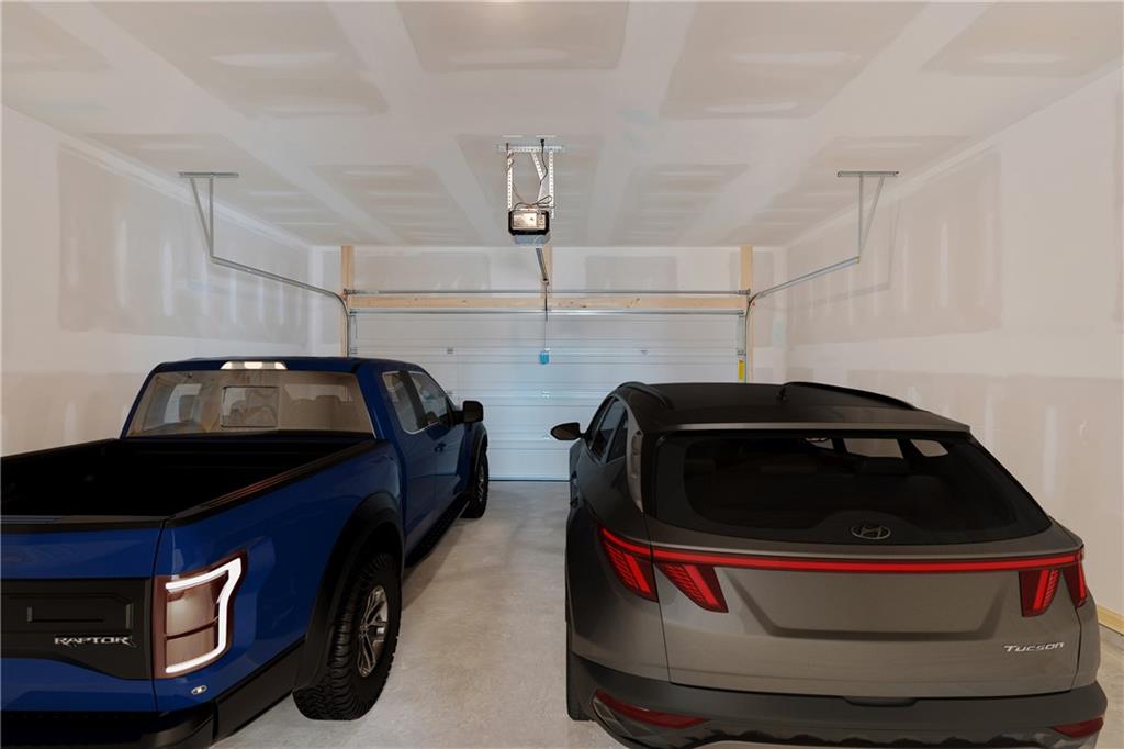 107 Lavender Circle Calhoun, GA 30701 - Photo 22 of 23 a car parked in a garage