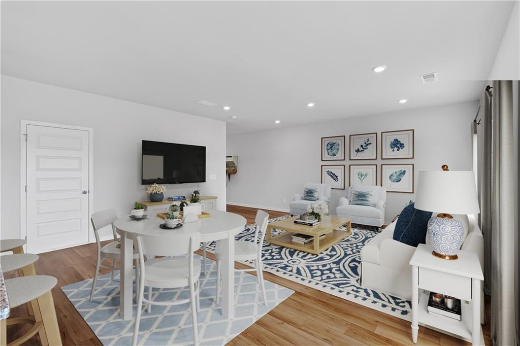 107 Lavender Circle Calhoun, GA 30701 - Photo 6 of 23 a living room with furniture and a flat screen tv